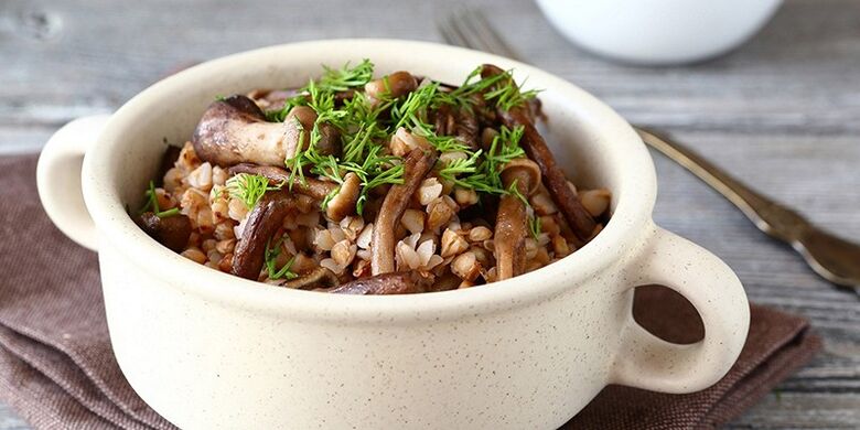 Buckwheat porridge with mushrooms for lunch on a healthy diet menu