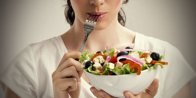 The girl eats properly to avoid problems related to excess weight